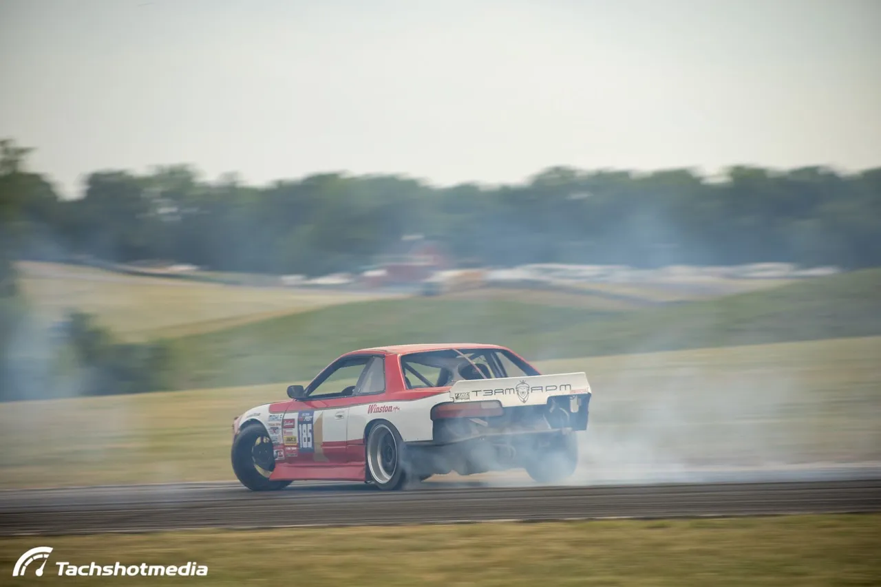Winston-livery number 185 S-chassis mid-drift with TEAM RPM wing banner