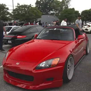 Red Honda S2000 at an outdoor club meet